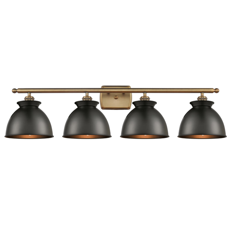 Adirondack Bath Vanity Light shown in the Brushed Brass finish with a Matte Black shade