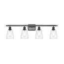 Ellery Bath Vanity Light shown in the Matte Black finish with a Clear shade