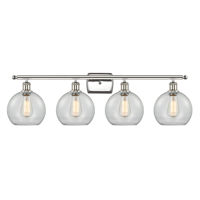 Athens Bath Vanity Light shown in the Polished Nickel finish with a Clear shade