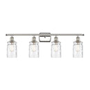 Candor Bath Vanity Light shown in the Polished Nickel finish with a Clear Waterglass shade