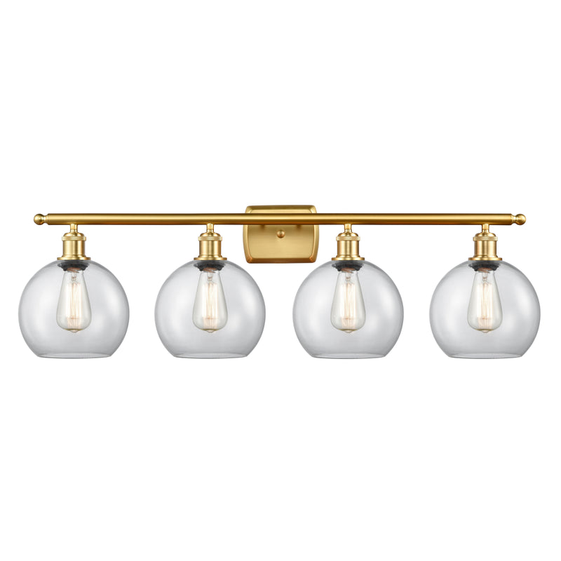 Athens Bath Vanity Light shown in the Satin Gold finish with a Clear shade