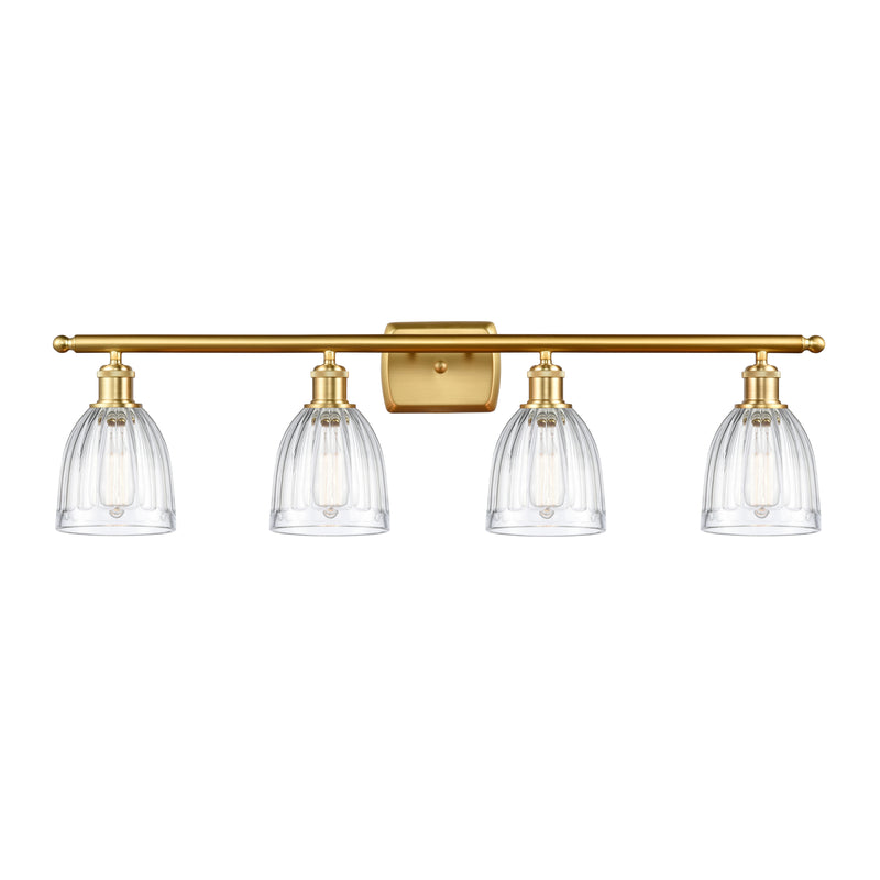 Brookfield Bath Vanity Light shown in the Satin Gold finish with a Clear shade