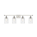 Candor Bath Vanity Light shown in the White and Polished Chrome finish with a Clear Waterglass shade