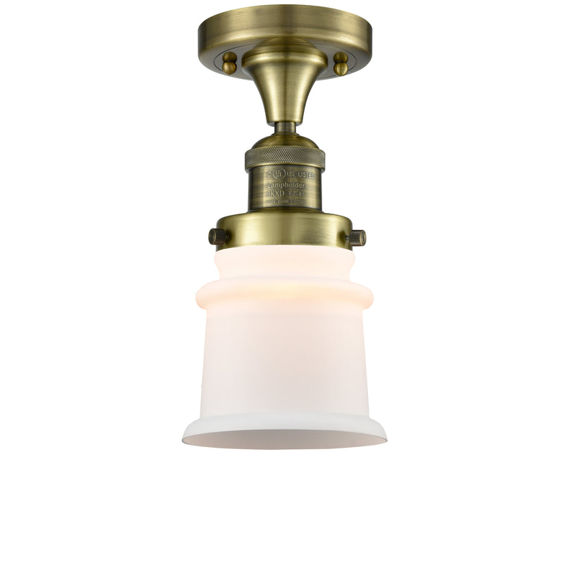 Canton Semi-Flush Mount shown in the Antique Brass finish with a Matte White shade