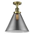 Cone Semi-Flush Mount shown in the Antique Brass finish with a Plated Smoke shade