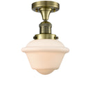 Oxford Semi-Flush Mount shown in the Antique Brass finish with a Matte White shade