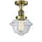 Oxford Semi-Flush Mount shown in the Antique Brass finish with a Clear shade