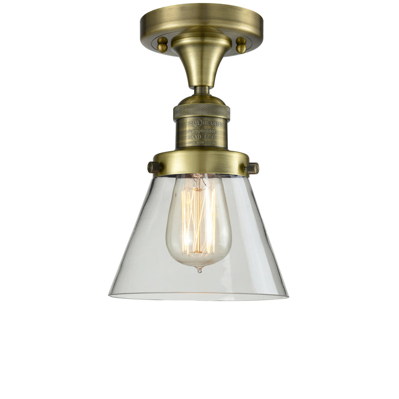 Cone Semi-Flush Mount shown in the Antique Brass finish with a Clear shade