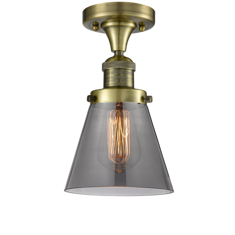 Cone Semi-Flush Mount shown in the Antique Brass finish with a Plated Smoke shade