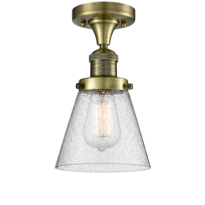 Cone Semi-Flush Mount shown in the Antique Brass finish with a Seedy shade