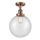 Beacon Semi-Flush Mount shown in the Antique Copper finish with a Seedy shade