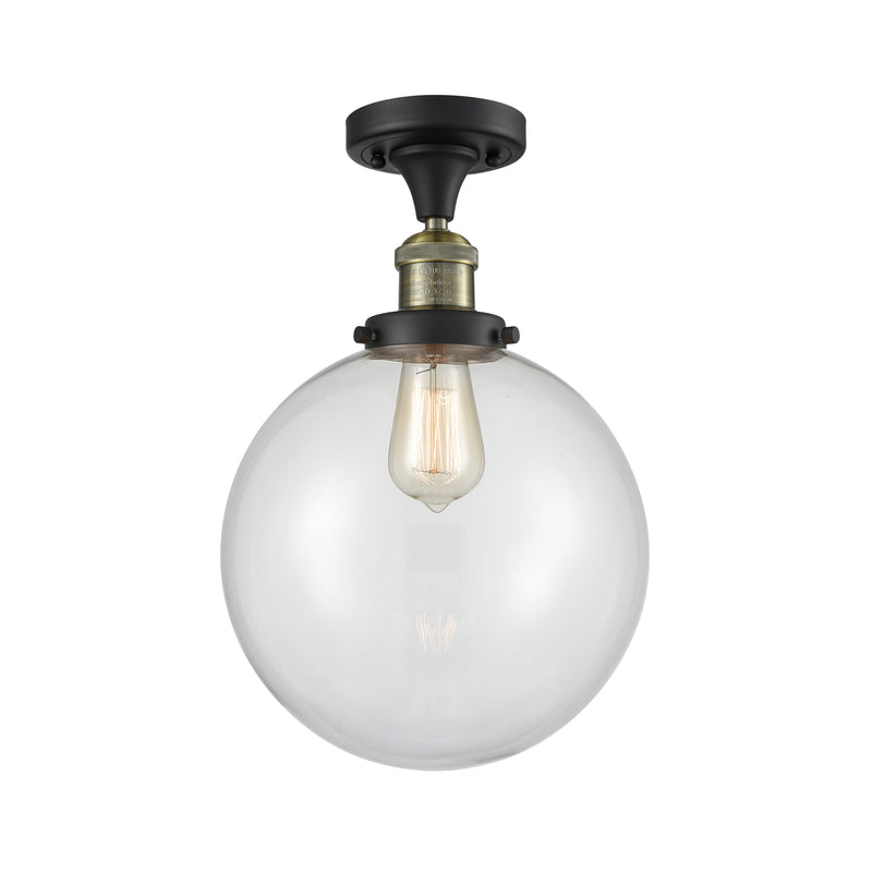 Beacon Semi-Flush Mount shown in the Black Antique Brass finish with a Clear shade