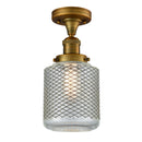 Stanton Semi-Flush Mount shown in the Brushed Brass finish with a Clear Wire Mesh shade