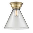 Cone Flush Mount shown in the Antique Brass finish with a Clear shade