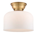 Bell Flush Mount shown in the Brushed Brass finish with a Matte White shade