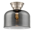 Bell Flush Mount shown in the Brushed Satin Nickel finish with a Plated Smoke shade