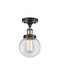 Beacon Semi-Flush Mount shown in the Black Antique Brass finish with a Clear shade