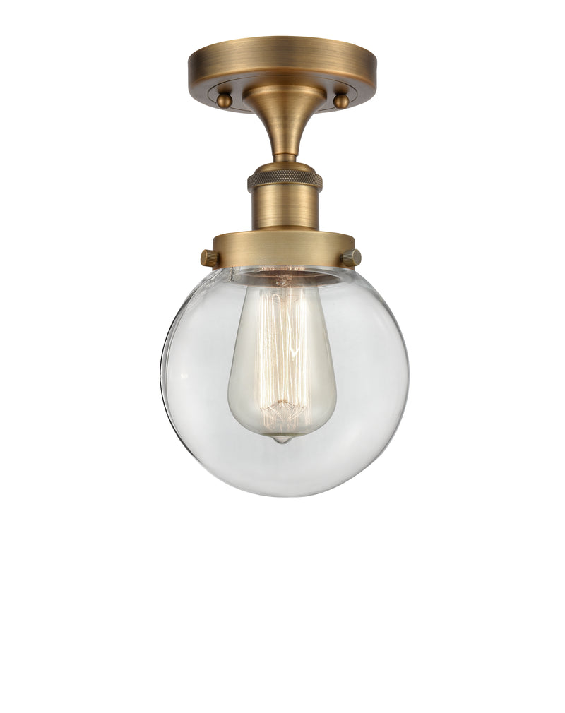 Beacon Semi-Flush Mount shown in the Brushed Brass finish with a Clear shade