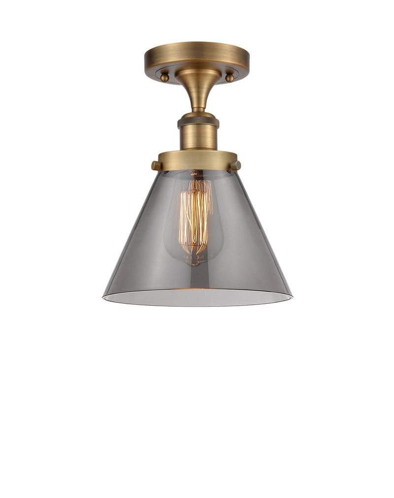 Cone Semi-Flush Mount shown in the Brushed Brass finish with a Plated Smoke shade