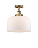 Bell Semi-Flush Mount shown in the Brushed Brass finish with a Matte White shade