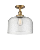 Bell Semi-Flush Mount shown in the Brushed Brass finish with a Seedy shade