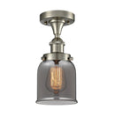 Bell Flush Mount shown in the Brushed Satin Nickel finish with a Plated Smoke shade