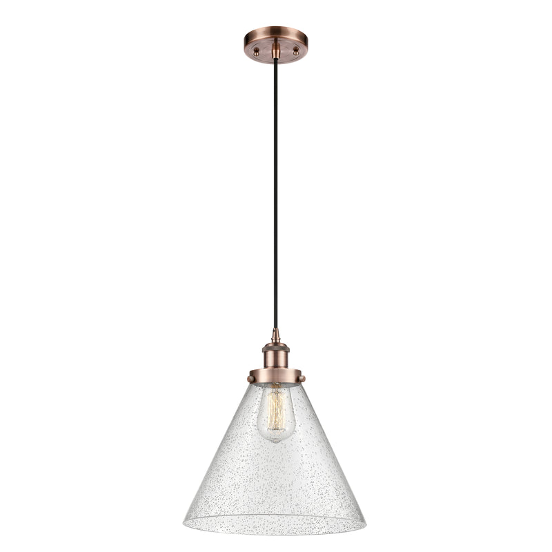 Cone Mini Pendant shown in the Antique Copper finish with a Seedy shade