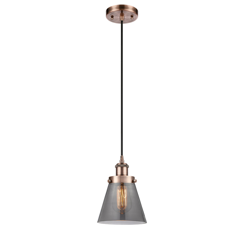 Cone Mini Pendant shown in the Antique Copper finish with a Plated Smoke shade