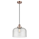 Bell Mini Pendant shown in the Antique Copper finish with a Seedy shade