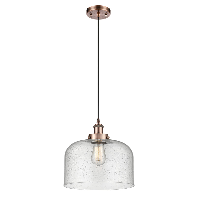 Bell Mini Pendant shown in the Antique Copper finish with a Seedy shade