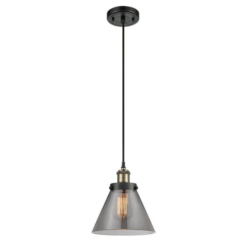 Cone Mini Pendant shown in the Black Antique Brass finish with a Plated Smoke shade