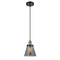 Cone Mini Pendant shown in the Black Antique Brass finish with a Plated Smoke shade