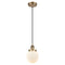 Beacon Mini Pendant shown in the Brushed Brass finish with a Matte White shade