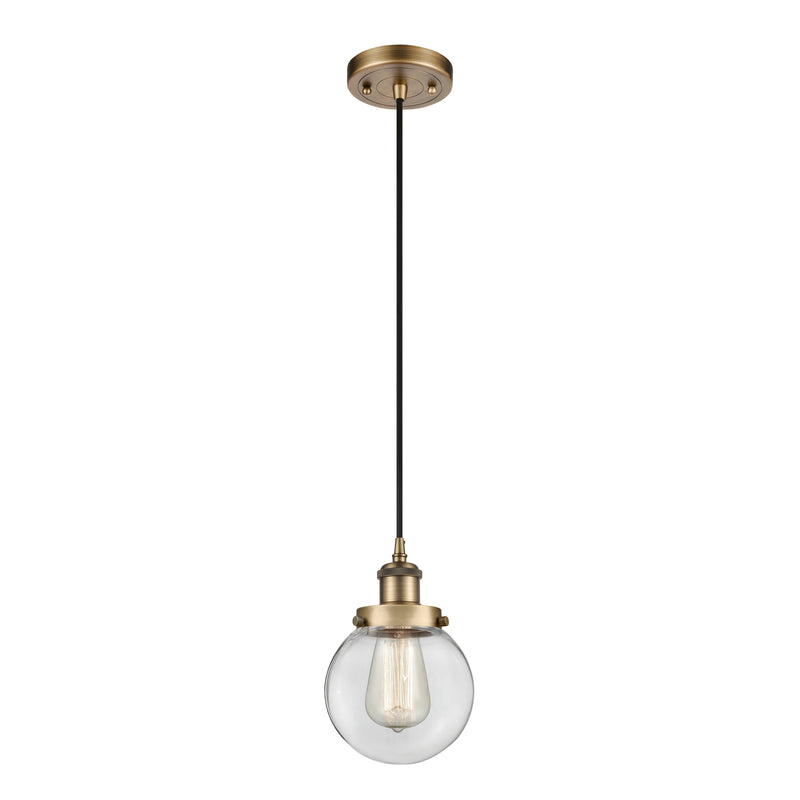 Beacon Mini Pendant shown in the Brushed Brass finish with a Clear shade