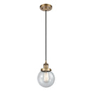 Beacon Mini Pendant shown in the Brushed Brass finish with a Seedy shade