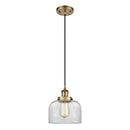 Bell Mini Pendant shown in the Brushed Brass finish with a Clear shade