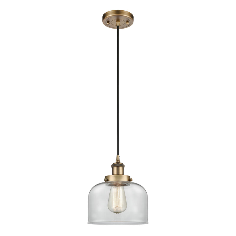 Bell Mini Pendant shown in the Brushed Brass finish with a Clear shade