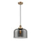 Bell Mini Pendant shown in the Brushed Brass finish with a Plated Smoke shade