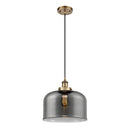 Bell Mini Pendant shown in the Brushed Brass finish with a Plated Smoke shade