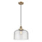 Bell Mini Pendant shown in the Brushed Brass finish with a Seedy shade