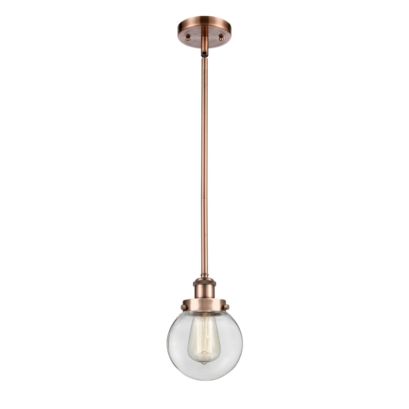 Beacon Mini Pendant shown in the Antique Copper finish with a Clear shade