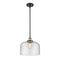 Bell Mini Pendant shown in the Black Antique Brass finish with a Seedy shade