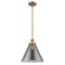 Cone Mini Pendant shown in the Brushed Brass finish with a Plated Smoke shade