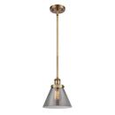 Cone Mini Pendant shown in the Brushed Brass finish with a Plated Smoke shade