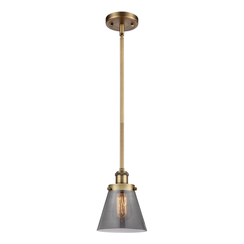 Cone Mini Pendant shown in the Brushed Brass finish with a Plated Smoke shade