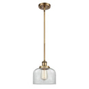 Bell Mini Pendant shown in the Brushed Brass finish with a Clear shade