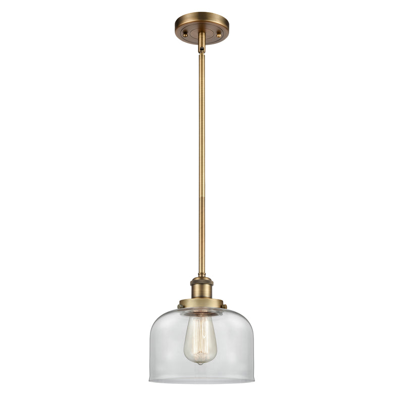 Bell Mini Pendant shown in the Brushed Brass finish with a Clear shade