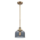 Bell Mini Pendant shown in the Brushed Brass finish with a Plated Smoke shade