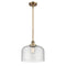 Bell Mini Pendant shown in the Brushed Brass finish with a Seedy shade