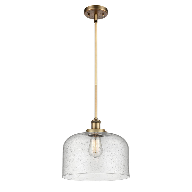 Bell Mini Pendant shown in the Brushed Brass finish with a Seedy shade